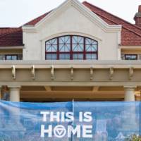This is Home banner in front of alumni house